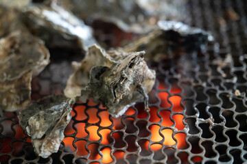 Grilled fresh oyster in Taiwan, famous street food.