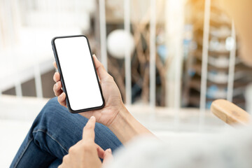 cell phone blank white screen mockup.hand holding texting using mobile on desk at office.background empty space for advertise.work people contact marketing business,technology
