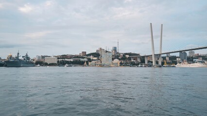 Panorama of the Russian city of Vladivstok. View from the moving ferry.
