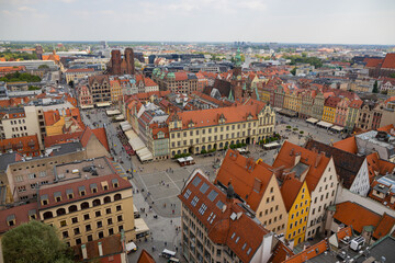 Fototapeta na wymiar Top view of Wroclaw. City center with colorful houses with red roofs and square. Poland