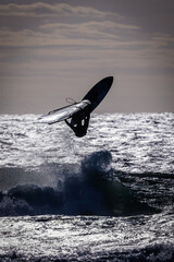 silhouette of a surfer