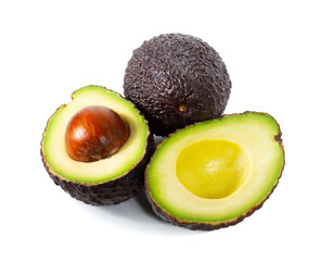 A fresh avocado cut in half - 575936695