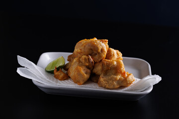 Chicken Karaage Japanese Fried chicken isolated in black background