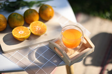 Orange juice on wooden table