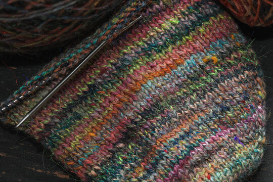 Beautiful handknit knitting samples socks, made with pure organic handspun sheep wool yarn from a traditional spinning wheel	