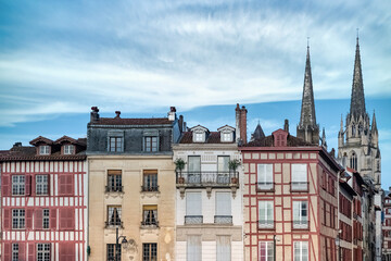 Bayonne in the pays Basque, typical facades, with the cathedral in background.