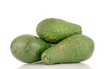 Three juicy avocados, macro, isolated on a white background.