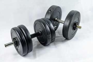 Fototapeta na wymiar Zwei Kurzhanteln fürs Gewichtetraining