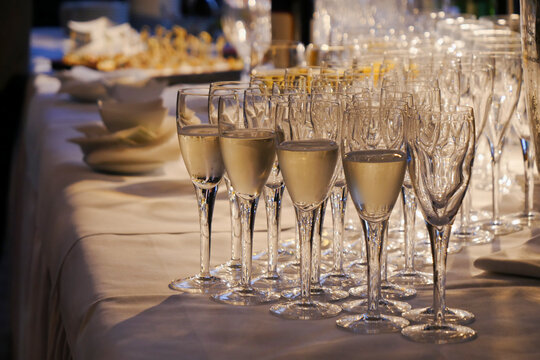 glasses of champagne on table event setting