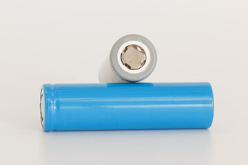 Rechargeable li-ion batteries for electrical appliances and devices  on white background.