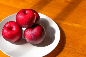 Red plums are a great source of fiber and vitamin C