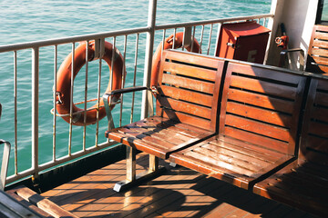 Wooden seats on the ferry boat.