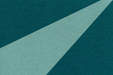 Fototapeta premium Texture of old craft cyan and dark emerald color paper background, macro. Vintage abstract teal cardboard