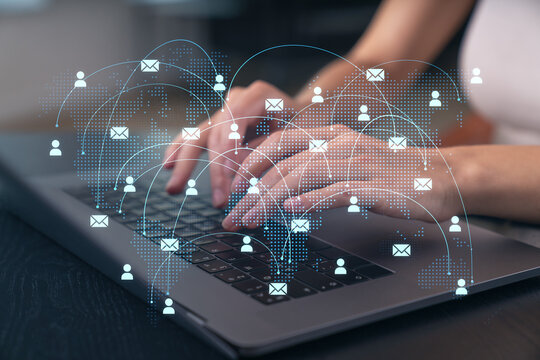 Woman typing on laptop at office workplace in background. Concept of working process, internet surfing, online business education. Student send e-mail. Close up view. Social network icons