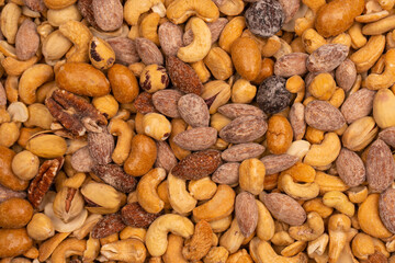 A group of almonds, pistachios, walnuts, macadamia, cashews.