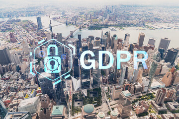 Fototapeta na wymiar Aerial panoramic helicopter city view, Lower Manhattan, Downtown, New York, USA. World Trade Center, bridges. GDPR hologram, concept of data protection regulation and privacy for all individuals