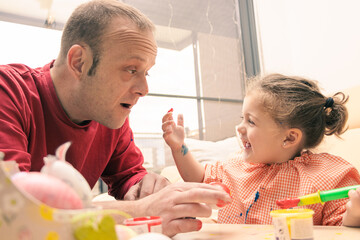 Creative Easter Eggs: Father and Daughter Decorating Together