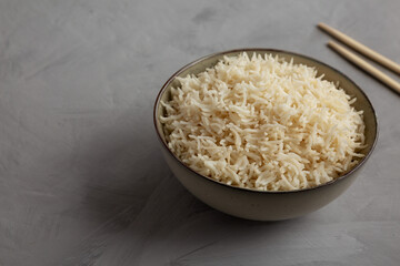 Homemade Cooked Basmati Rice in a Bowl, side view. Copy space.