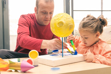From cardboard and cork to works of art: father and daughter paint recycled handicrafts