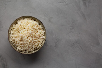 Homemade Cooked Basmati Rice in a Bowl, top view. Flat lay, overhead, from above. Copy space.