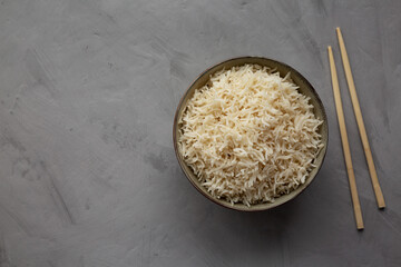 Homemade Cooked Basmati Rice in a Bowl, top view. Flat lay, overhead, from above. Copy space.
