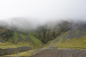 Rocks and fog at Raudfeldsgja Gorge on Snaefellsnes Peninsula in Iceland