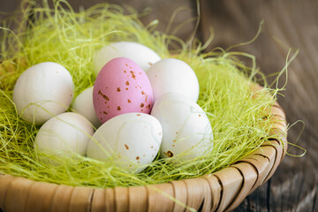 Easter composition with eggs in a decorative nest.