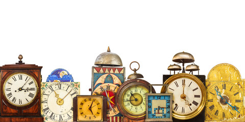 Collection of different vintage table clocks in a row