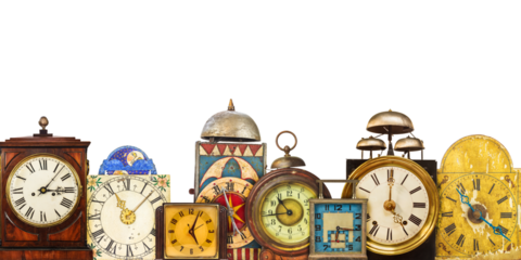 Collection of different vintage table clocks in a row