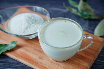 Matcha latte green cup. Fashionable tea trend from Japan.