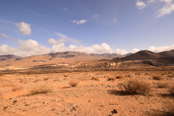 Fototapeta na wymiar Mountain landscape with a sandy strip on a sunny day
