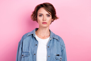 Fototapeta premium Photo portrait of confident attractive woman bob brown hairstyle wear retro denim jacket stylish white t-shirt isolated on pink color background