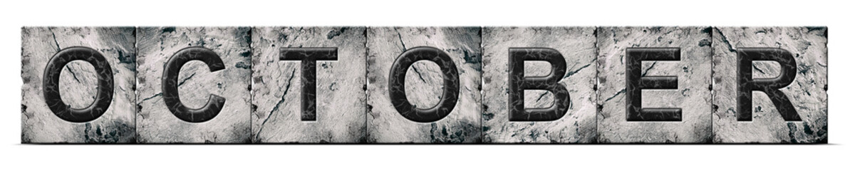 October, word on an alphabet on stone blocks, isolated on white background. Month of the year concept.