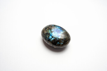 Labradorite polished mineral on white background