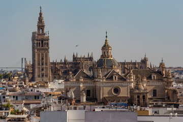 Fototapeta premium Aerial view of The Cathedral of Saint Mary of the See, better known as Seville Cathedral, Roman Catholic cathedral in Seville, Andalusia, Spain