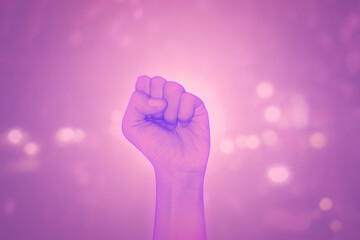 A female hand poster on purple background.