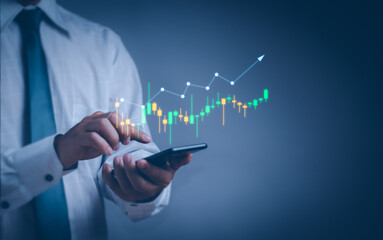 investor or trader Using phone showing virtual stock chart hologram, investment planning and strategy concept, stock market, mutual fund, bonds, digital assets