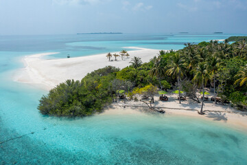 Aerial view: lonely Island with a sandbank and Palmtrees in the Maldives, North Male Atoll,...