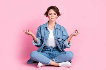 Full length photo of sweet charming lady dressed denim jacket closed eyes enjoying yoga isolated pink color background