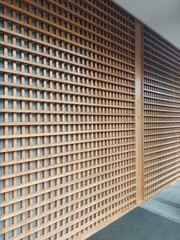 Modern natural wood slats with stone background. Modern Zen Japanese wall wooden fluted panel in...