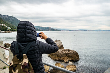 View of the gulf of Trieste from viale Miramare on a cloudy day, Friuli Venezia Giulia - Italy