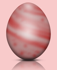 A red easter egg with a pattern reflecting off the surface. Religion concept, Easter.