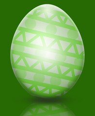 A green Easter egg with a pattern is reflected from the surface. Religion concept, Easter.