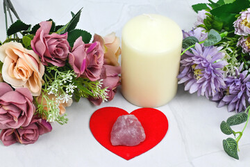 Rose quartz on heart background, everyday rituals, spell spiritual new age mindfulness living.