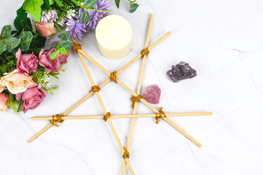 Wooden pentagram, Pagan Branch Pentagram - witchcraft tools of natural wood, aroma wax candle, crystals stone healing, rose quart, amethyst bouquet flowers, Occultism, mysticism,spiritual mindfulness
