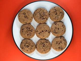 Cookies on a plate red backdrop