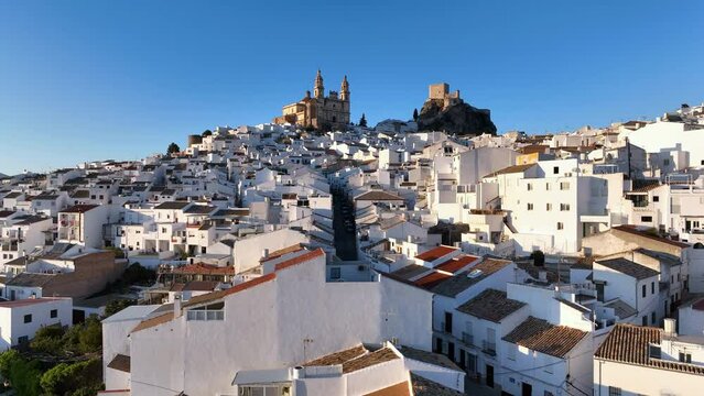 aerial view of Castillo de Olvera Towering On White Village In Olvera, Province of Cadiz, Spain