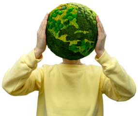 Woman holds a green planet Earth in place of the head. Symbol of sustainable development and renewable energy	