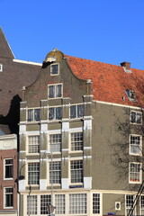 Amsterdam Geldersekade Historic House Exterior with Red Tiles Roof, Netherlands