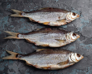 Salted dried roach fish. Fish appetizer for beer